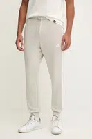 Tepláky adidas Essentials pánské, béžová barva, s aplikací, JE6317