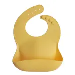 Mushie silikónový podbradník mineral yellow