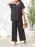 Resti Women's set with short sleeves, decorative flower, and wide pants