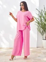 Resti Women's short-sleeved set with decorative flower and wide trousers