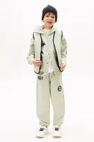 Tepláky Tommy Hilfiger tyrkysová barva, KB0KB09700