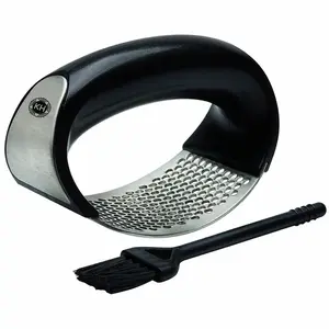 Ručný lis na cesnak + kefka