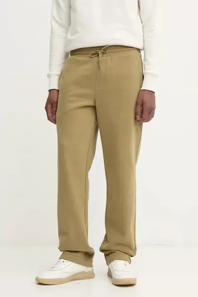 Bavlněné tepláky Calvin Klein Jeans zelená barva, J30J326749