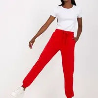 Red sweatpants tied at the waist
