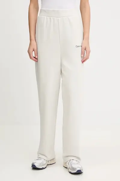 Tepláky Calvin Klein Performance dámské, béžová barva, LVGWF5P627