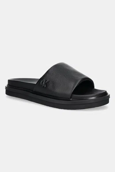 Pantofle Calvin Klein Jeans FLAT MOLDED SLIDE SANDAL LTH pánské, černá barva, YM0YM01225