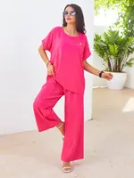 Resti Women's set with short sleeves, decorative flower, and wide trousers