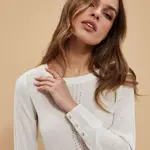 Svetr s prolamovaným zdobením