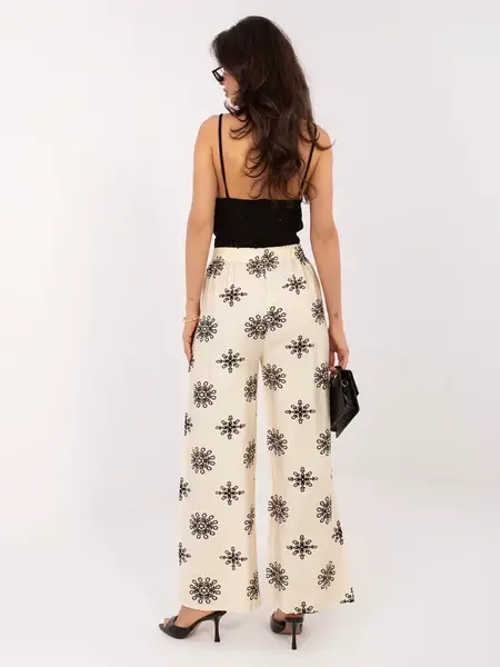 Jasnobéžové vzorované kalhoty