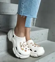 D/CEO White closed platform flip-flops decorated with Aria pins