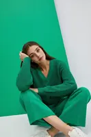 Krátký kardigan se zapínáním na knoflíky