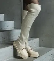 Gemre Light beige boots with a stretchy shaft on a flat heel Vrissa