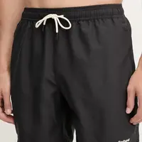 Plavkové šortky Barbour Staple Logo 7" Swim Short černá barva, MSW0093