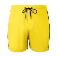 YEAZ Plavecké šortky 'Seatbeat'  žltá / čierna / šedobiela