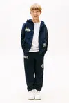 Tepláky Tommy Hilfiger tmavomodrá barva, KB0KB09700