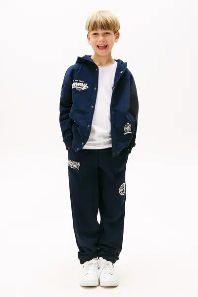 Tepláky Tommy Hilfiger tmavomodrá barva, KB0KB09700