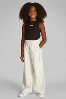 Dětské tepláky Calvin Klein Jeans béžová barva, hladké, IG0IG02876