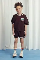 Dětské bavlněné šortky Mini Rodini hnědá barva, hladké, 2523013916