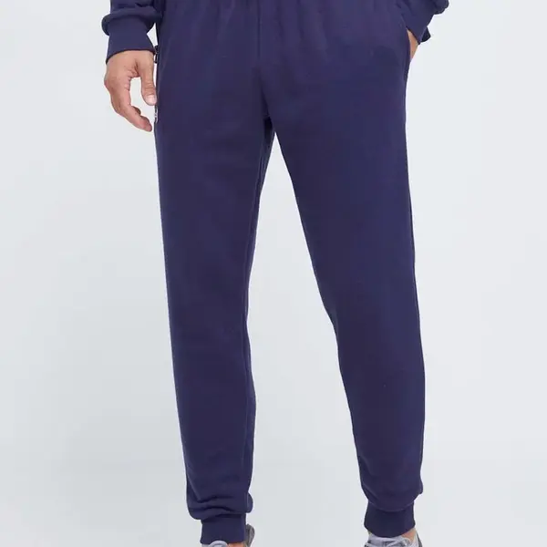 Tepláky Under Armour tmavomodrá barva, hladké, 1379774