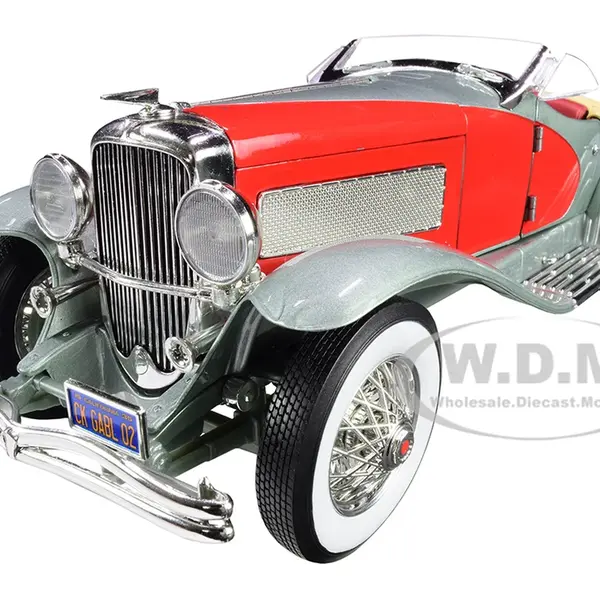 1935 Duesenberg SSJ Speedster Green Metallic with Enamel Red Coves 1/18 Diecast Model Car by Auto World