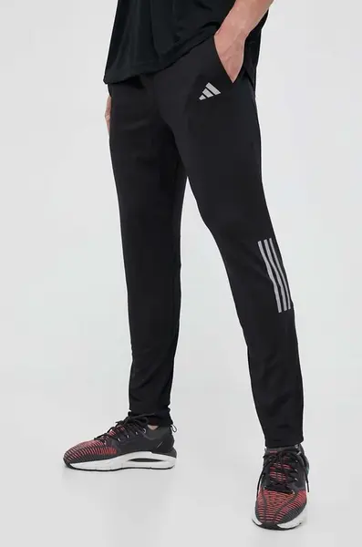 Běžecké kalhoty adidas Performance Own The Run černá barva, s potiskem, HN0806