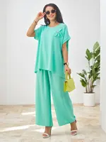 Resti Women's set with short sleeves, decorative flower and wide pants