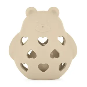 PETITE&MARS Hračka silikonová s chrastítkem Bear Basil Desert Sand 0m+