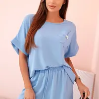 Kesi Włoski Dámský komplet z viskózy s ozdobným květem a širokými kalhotami - modrý