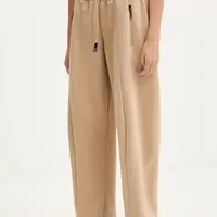 Tepláky adidas Z.N.E. béžová farba, jednofarebné, JW7770