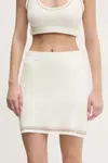 Sukně Dkny béžová barva, mini, pouzdrová, DP5R6026