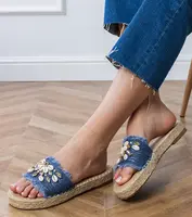 Gemre Blue braided espadrille slides with walrus shells