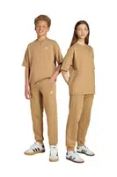 Dětské tepláky adidas Originals béžová barva, JX2753