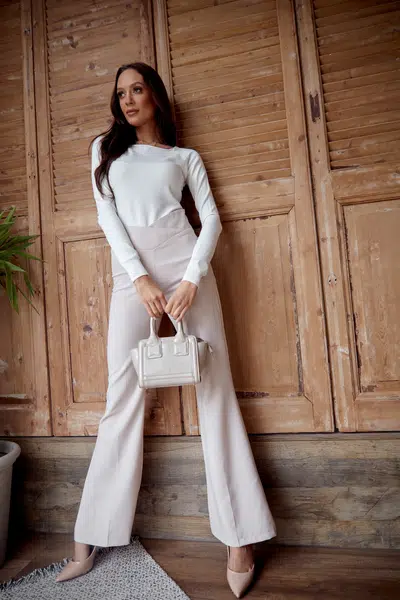 Elegantní dámské kalhoty s rozšířenými nohavicemi, světle béžová