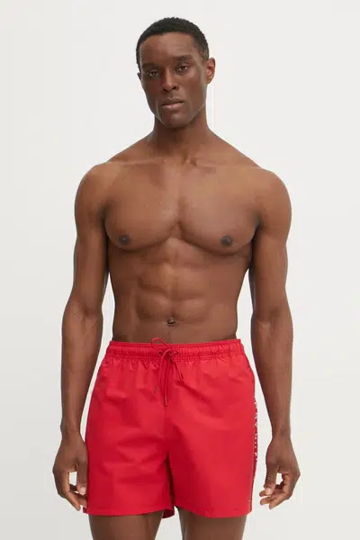 Plavkové šortky Tommy Hilfiger červená barva, UM0UM03481