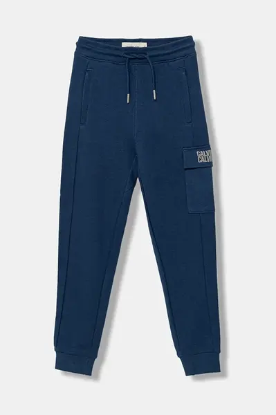 Dětské bavlněné tepláky Calvin Klein Jeans TERRY modrá barva, IB0IB02522