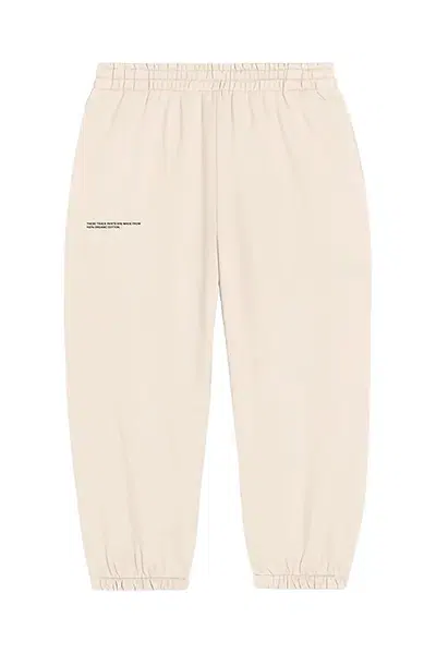 Kalhoty Pangaia KIDS' 365 MIDWEIGHT TRACK PANTS béžová barva, 10000280