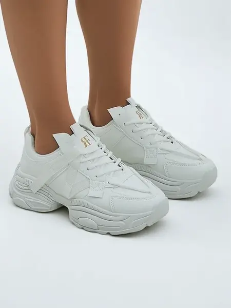Resti Women's sporty sneakers on a thicker sole Quensi