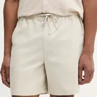 Lněné kraťasy Barbour Cotton Linen Relaxed Short pánské, béžová barva, MST0056