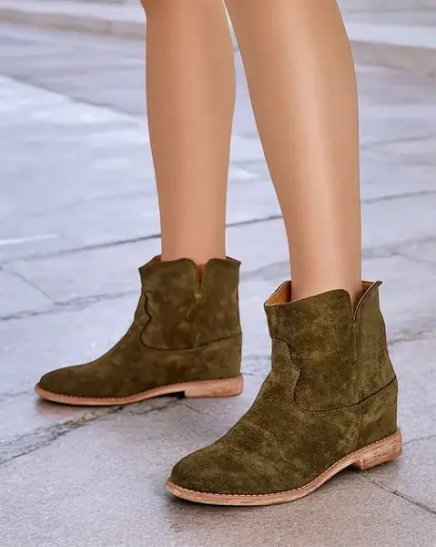 Resti Cowboy-style ankle boots on a covered wedge Blueston