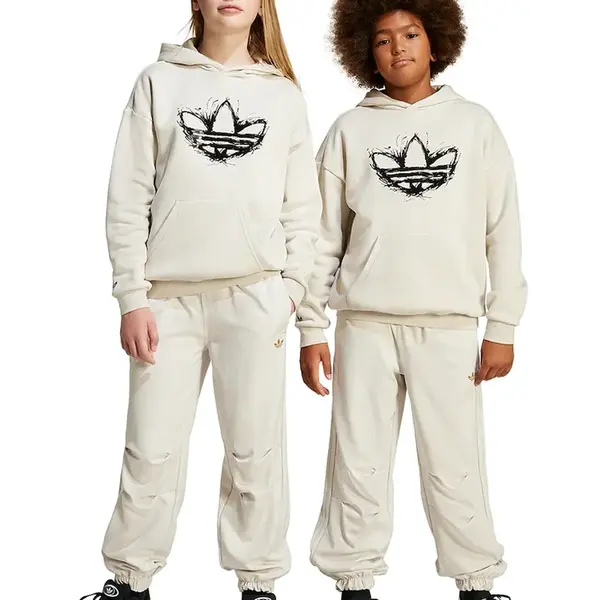 Dětské tepláky adidas Originals béžová barva, hladké, JC9073