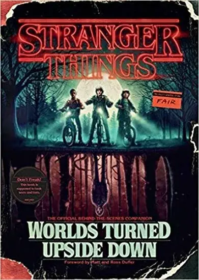 Stranger Things: Worlds Turned Upside Down : The Official Behind-The-Scenes Companion (poškozená) - Gina McIntyre