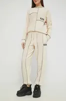 Tepláky Ellesse dámské, béžová barva, hladké