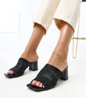 Gemre Black heeled sandals with woven straps Gamboa