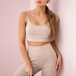 Striped top complete with beige blouse