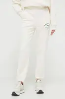 Tepláky Fila béžová barva, s aplikací