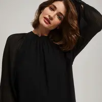 Shirt with gathered sleeves