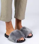 Gemre Gray flip-flops with Manny fur