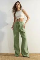 Trendyol Green 100% lněné kalhoty s vysokým pasem a širokými nohavicemi s elastickým pasem.