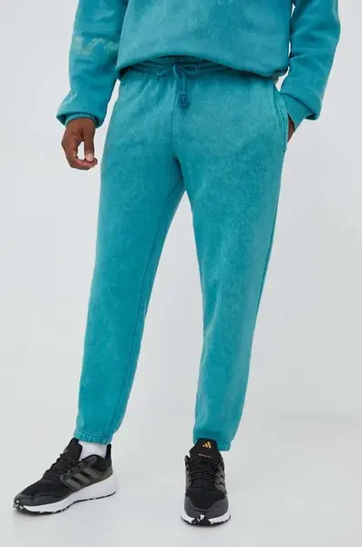 Tepláky adidas tyrkysová barva, vzorované