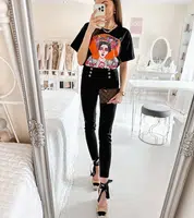 Gemre Black leggings adorned with Boulanger buttons